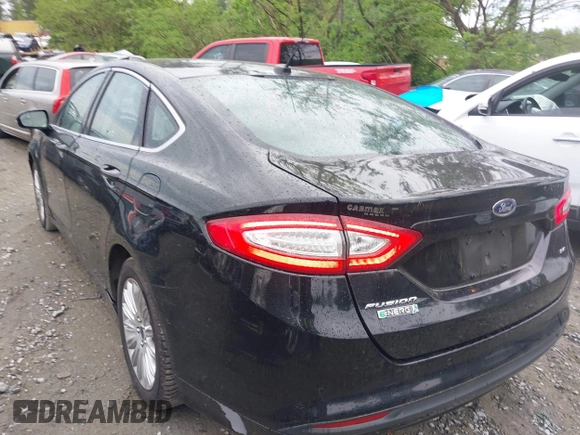 2016 Ford Fusion Energi SE Luxury with VIN 3FA6P0PU7GR293099, listed as a IAAI auction lot 42079873 with 194,755 mi miles. Bid and sale history available at carsss.com. Image 3.