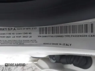 2018 Maserati Ghibli S Q4 z VIN ZAM57YTA5J1268683, wystawiony jako IAAI lot #42359671 z przebiegiem 54 981 mil mil oraz . Historia ofert i sprzedaży dostępna na DreamBid. Obrazek 9.