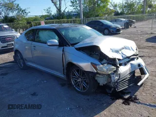 2012 Scion tC with VIN JTKJF5C77C3032559, listed as a IAAI auction lot 41892954 with 207,718 mi miles. Bid and sale history available at carsss.com. Image 1.
