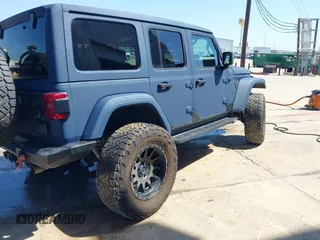 2022 Jeep Wrangler Unlimited Sahara with VIN 1C4HJXEN1NW262546, listed as a IAAI auction lot 41975925 with 17,994 mi miles and . Bid and sale history available at DreamBid. Image 4.