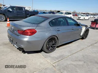 2015 BMW M6 z VIN WBS6C9C56FD467608, wystawiony jako Copart lot #49823385 z przebiegiem 67 748 mil mil oraz Czysty tytuł • Clean title. Historia ofert i sprzedaży dostępna na DreamBid. Obrazek 3.