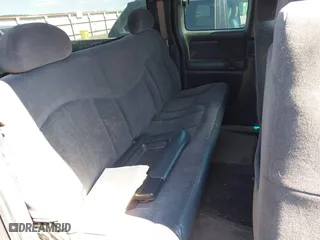 2002 Chevrolet Silverado 1500 LT with VIN 2GCEK19T821314733, listed as a IAAI auction lot 42057566 with 244,783 mi miles. Bid and sale history available at carsss.com. Image 8.