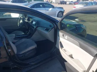 2016 Hyundai Sonata 2.4L SE with VIN 5NPE24AF6GH323234, listed as a IAAI auction lot 41369371 with 136,804 mi miles. Bid and sale history available at carsss.com. Image 5.