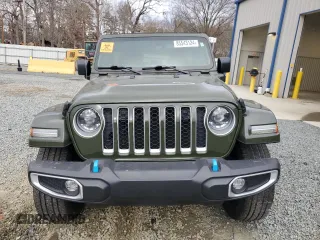 2023 Jeep Wrangler Sahara with VIN 1C4JJXP62PW553101, listed as a Copart auction lot 85543124 with 28,157 mi miles and Salvage Title. Bid and sale history available at DreamBid. Image 5.