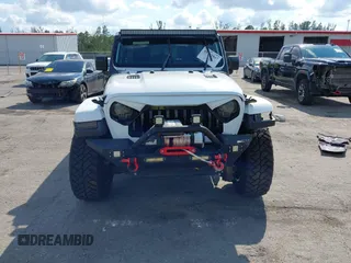 2020 Jeep Wrangler Unlimited Sahara with VIN 1C4HJXEN7LW213459, listed as a IAAI auction lot 41502047 with 40,816 mi miles. Bid and sale history available at carsss.com. Image 12.