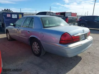 2005 Mercury Grand Marquis LS Premium with VIN 2MEFM75W75X664470, listed as a IAAI auction lot 41960637 with 191,600 mi miles. Bid and sale history available at carsss.com. Image 3.