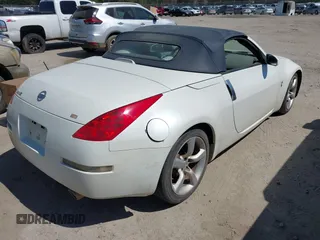2006 Nissan 350Z Touring with VIN JN1AZ36A96M452478, listed as a IAAI auction lot 41843993 with 211,567 mi miles. Bid and sale history available at carsss.com. Image 4.