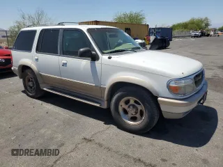 1998 Ford Explorer XL with VIN 1FMZU34E8WZB07901, listed as a Copart auction lot 57253765 with 340,508 mi miles and Clean title. Bid and sale history available at DreamBid. Image 4.