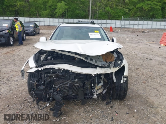 2021 Infiniti Q50 Luxe z VIN JN1EV7BP7MM700965, wystawiony jako IAAI lot #41998024 z przebiegiem 44 897 mil mil oraz . Historia ofert i sprzedaży dostępna na DreamBid. Obrazek 6.