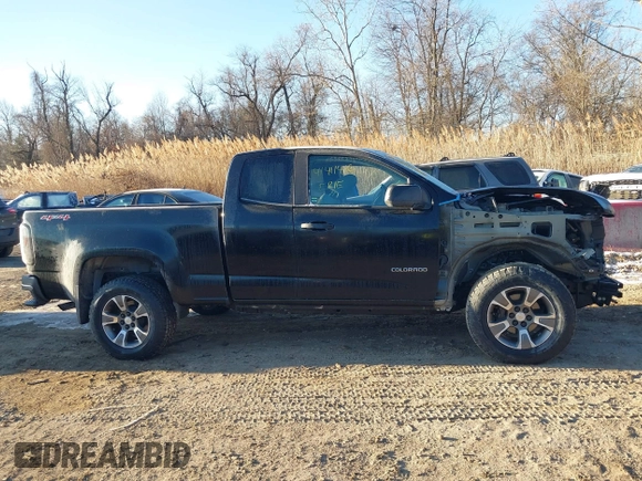 2019 Chevrolet Colorado 4WD Work Truck z VIN 1GCHTBEN9K1226626, wystawiony jako IAAI lot #41411416 z przebiegiem 56 819 mil mil oraz . Historia ofert i sprzedaży dostępna na DreamBid. Obrazek 14.