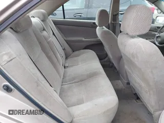 2002 Toyota Camry XLE z VIN 4T1BF32K42U533788, wystawiony jako IAAI lot #42024918 z przebiegiem 120 168 mil mil oraz . Historia ofert i sprzedaży dostępna na DreamBid. Obrazek 8.