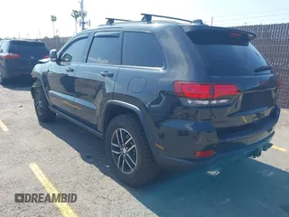 2018 Jeep Grand Cherokee Trailhawk with VIN 1C4RJFLT0JC316172, listed as a IAAI auction lot 42174162 with 81,891 mi miles and . Bid and sale history available at DreamBid. Image 3.