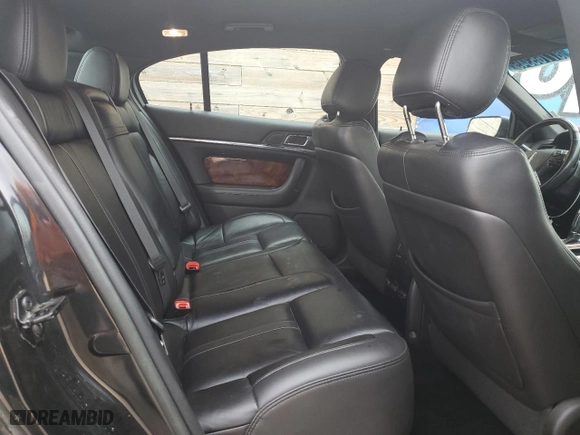 2014 Lincoln MKS EcoBoost with VIN 1LNHL9FT9EG607363, listed as a Copart auction lot 87765345 with 121,615 mi miles and Clean Title. Bid and sale history available at carsss.com. Image 10.