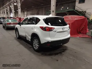 2016 Mazda CX-5 Touring with VIN JM3KE4CY0G0853261, listed as a IAAI auction lot 41861176 with 63,491 mi miles. Bid and sale history available at carsss.com. Image 3.