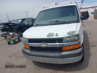 2012 Chevrolet Express Cargo Van with VIN 1GCWGFCA7C1121989, listed as a IAAI auction lot 42118853 with 214,478 mi miles. Bid and sale history available at carsss.com. Image 12.
