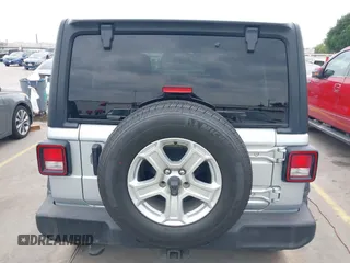 2023 Jeep Wrangler Sport with VIN 1C4HJXDG2PW508235, listed as a IAAI auction lot 42127823 with 25,069 mi miles and . Bid and sale history available at DreamBid. Image 16.