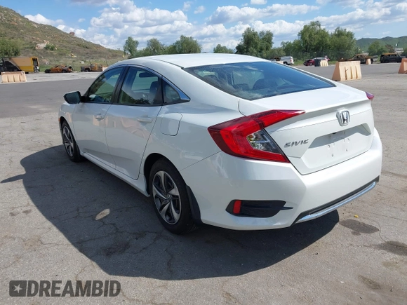 2020 Honda Civic Sedan LX with VIN 19XFC2F64LE201551, listed as a IAAI auction lot 41939055 with 67,461 mi miles. Bid and sale history available at carsss.com. Image 3.