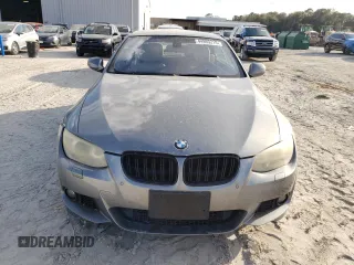 2011 BMW 3 Series 335i with VIN WBADX7C5XBE580244, listed as a Copart auction lot 44993215 with 124,091 mi miles and Salvage Title. Bid and sale history available at carsss.com. Image 5.