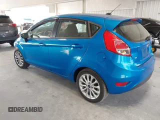 2014 Ford Fiesta SE with VIN 3FADP4EJ7EM204438, listed as a IAAI auction lot 42098291 with 184,930 mi miles and . Bid and sale history available at DreamBid. Image 3.