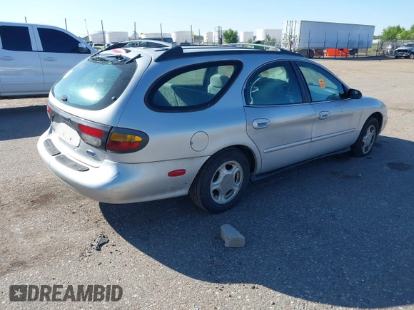 1996 Ford Taurus GL z VIN 1FALP57U9TG184497, wystawiony jako IAAI lot #42290105 z przebiegiem 149 155 mil mil oraz . Historia ofert i sprzedaży dostępna na DreamBid. Obrazek 4.