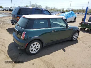 2006 MINI Hardtop with VIN WMWRC33546TK15957, listed as a Copart auction lot 54660995 with 100,893 mi miles and Clean Title. Bid and sale history available at DreamBid. Image 3.