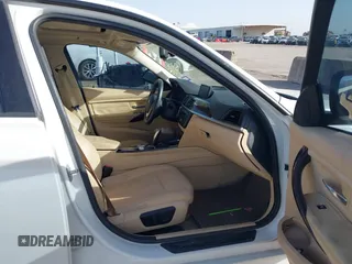 2014 BMW 3 Series 328i with VIN WBA3A5G5XENP32345, listed as a IAAI auction lot 42303835 with 100,235 mi miles and . Bid and sale history available at DreamBid. Image 5.