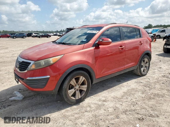 2011 Kia Sportage LX z VIN KNDPB3A28B7052948, wystawiony jako Copart lot #61052775 z przebiegiem 162 633 mil mil oraz Czysty tytuł • Clean title. Historia ofert i sprzedaży dostępna na DreamBid. Obrazek 1.