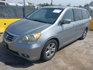 2010 Honda Odyssey Touring с VIN 5FNRL3H90AB038351, выставлен на аукционе IAAI как лот 42036500 с пробегом 176 304 миль миль и . История ставок и продаж доступна на DreamBid. Изображение 2.