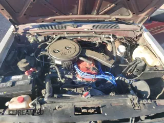 1989 Nissan Hardbody z VIN 1N6ND11S7KC371977, wystawiony jako Copart lot #77245404 z przebiegiem 202 526 mil mil oraz Tytuł czysty. Historia ofert i sprzedaży dostępna na DreamBid. Obrazek 11.