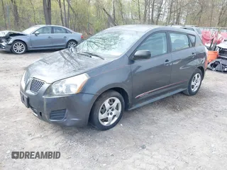 2009 Pontiac Vibe w/1SA with VIN 5Y2SL67859Z404323, listed as a IAAI auction lot 42172647 with 179,874 mi miles. Bid and sale history available at carsss.com. Image 2.