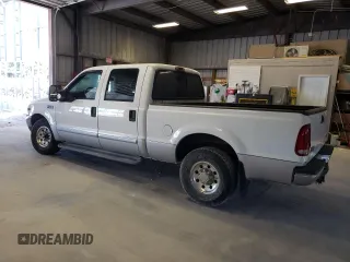 2002 Ford F-250 XL with VIN 1FTNW20S72EB45107, listed as a Copart auction lot 69238304 with 205,294 mi miles and Salvage Title. Bid and sale history available at DreamBid. Image 2.