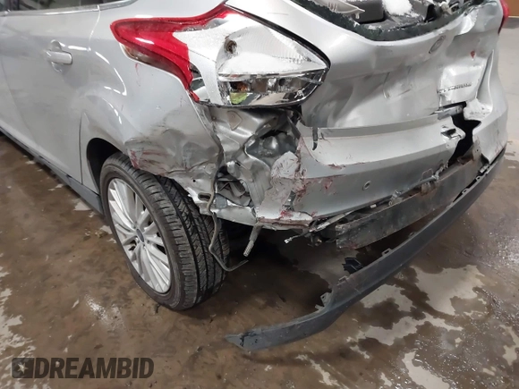 2018 Ford Focus Titanium with VIN 1FADP3N25JL261736, listed as a IAAI auction lot 41032128 with 59,142 mi miles and . Bid and sale history available at DreamBid. Image 6.