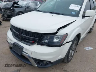 2016 Dodge Journey Crossroad Plus z VIN 3C4PDCGB9GT148592, wystawiony jako IAAI lot #41637712 z przebiegiem 145 662 mil mil oraz . Historia ofert i sprzedaży dostępna na DreamBid. Obrazek 6.