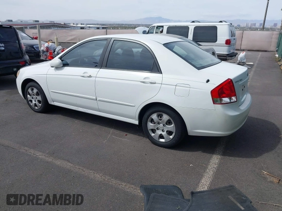 2009 Kia Spectra EX with VIN KNAFE221795630995, listed as a IAAI auction lot 41928252 with 126,694 mi miles. Bid and sale history available at carsss.com. Image 3.