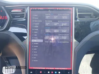 2018 Tesla Model X 75D with VIN 5YJXCAE45JF103828, listed as a IAAI auction lot 41698708 with 118,699 mi miles and . Bid and sale history available at carsss.com. Image 7.