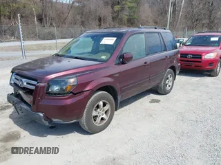 2007 Honda Pilot EX-L with VIN 5FNYF18587B021312, listed as a IAAI auction lot 41801006 with 261,842 mi miles. Bid and sale history available at carsss.com. Image 2.