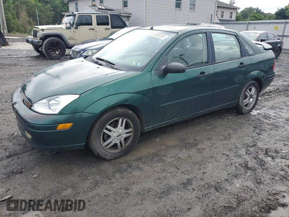 2000 Ford Focus SE with VIN 1FAFP3433YW354797, listed as a Copart auction lot 61430265 with 165,202 mi miles and Salvage title. Bid and sale history available at DreamBid. Image 1.