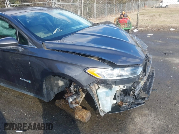 2015 Ford Fusion S Hybrid with VIN 3FA6P0UU9FR283189, listed as a IAAI auction lot 41632307 with 152,653 mi miles. Bid and sale history available at carsss.com. Image 19.