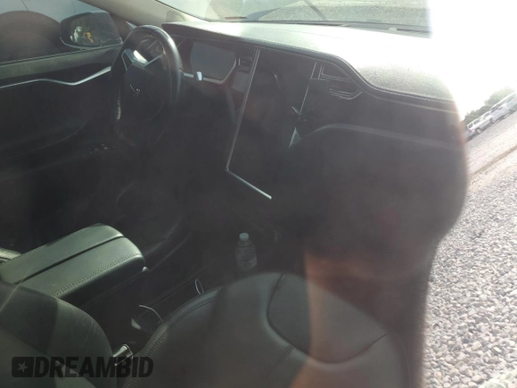 2014 Tesla Model S 60 with VIN 5YJSA1H1XEFP32590, listed as a Copart auction lot 64424145 with Not provided miles and Clean title. Bid and sale history available at DreamBid. Image 8.