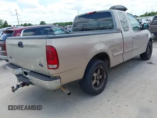 1998 Ford F-150 XL with VIN 1FTRX17LXWNA45807, listed as a IAAI auction lot 42570514 with 240,273 mi miles and . Bid and sale history available at DreamBid. Image 4.