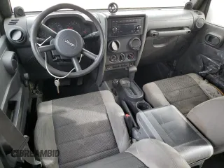2007 Jeep Wrangler Unlimited X z VIN 1J4GA39197L181305, wystawiony jako Copart lot #45928555 z przebiegiem Nie podano mil oraz Szkoda całkowita • Salvage title. Historia ofert i sprzedaży dostępna na DreamBid. Obrazek 8.