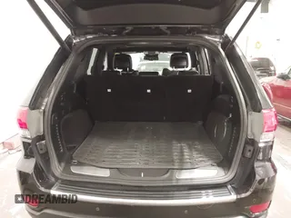 2014 Jeep Grand Cherokee Limited with VIN 1C4RJFBG4EC182065, listed as a IAAI auction lot 42291900 with 131,868 mi miles and . Bid and sale history available at DreamBid. Image 18.