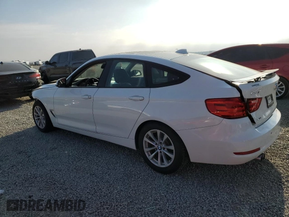2014 BMW 3 Series 328i Gran Turismo xDrive with VIN WBA3X5C57ED242679, listed as a Copart auction lot 48598665 with 69,712 mi miles and Salvage title. Bid and sale history available at DreamBid. Image 2.