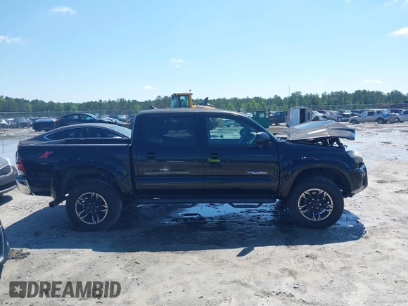 2015 Toyota Tacoma z VIN 3TMLU4EN3FM186765, wystawiony jako IAAI lot #42235553 z przebiegiem 183 878 mil mil oraz . Historia ofert i sprzedaży dostępna na DreamBid. Obrazek 14.