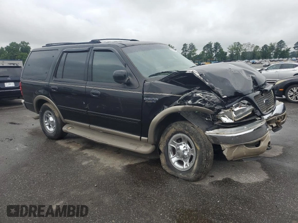 2002 Ford Expedition Eddie Bauer with VIN 1FMPU18LX2LA39571, listed as a Copart auction lot 58774915 with 388,886 mi miles and Salvage title. Bid and sale history available at DreamBid. Image 4.