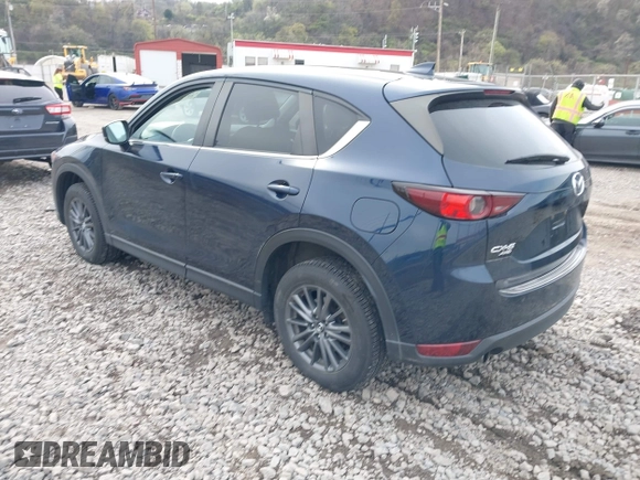 2019 Mazda CX-5 Touring with VIN JM3KFBCM5K0689948, listed as a IAAI auction lot 41976266 with 74,812 mi miles. Bid and sale history available at carsss.com. Image 3.