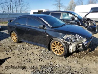 2010 Mitsubishi Lancer GTS with VIN JA32U8FW8AU031934, listed as a Copart auction lot 51247365 with 122,500 mi miles and Salvage Title. Bid and sale history available at carsss.com. Image 4.