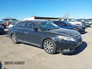 2012 Toyota Avalon with VIN 4T1BK3DB4CU442885, listed as a IAAI auction lot 40713053 with 144,383 mi miles. Bid and sale history available at carsss.com. Image 1.