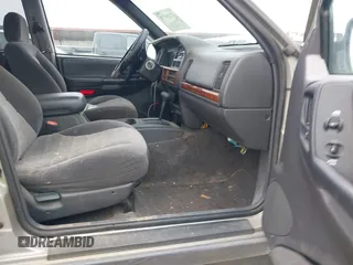 1998 Jeep Grand Cherokee Laredo with VIN 1J4FX58S6WC354101, listed as a IAAI auction lot 42158671 with 289,318 mi miles and . Bid and sale history available at DreamBid. Image 5.