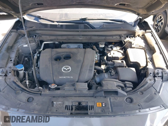 2020 Mazda CX-5 Grand Touring with VIN JM3KFADM3L1812649, listed as a IAAI auction lot 42575393 with 102,118 mi miles and . Bid and sale history available at DreamBid. Image 10.